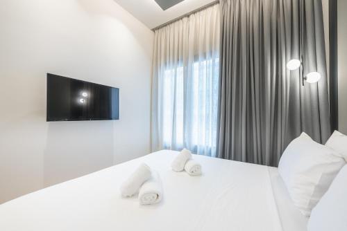Cama o camas de una habitación en The Asprogeraka - self check-in rooms