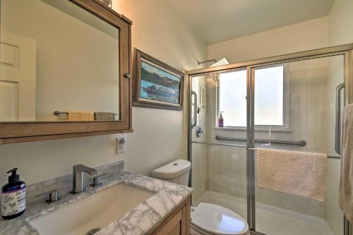 a bathroom with a sink and a shower and a toilet at Pet-Friendly Phoenix Home with Breezeway and Fire Pit! in Phoenix