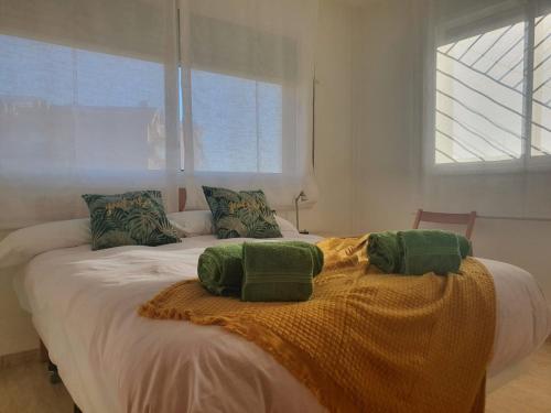 Postel nebo postele na pokoji v ubytování Apartaments Flamingo