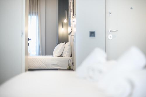 Cama o camas de una habitación en The Asprogeraka - self check-in rooms