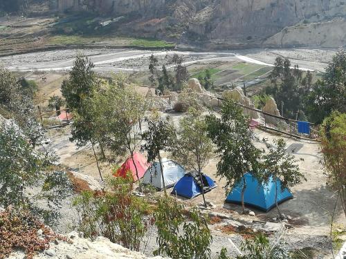 a group of tents sitting on top of a mountain at Colibrí Eco Lodge & Camping in La Paz