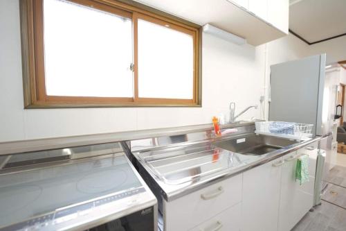 Η κουζίνα ή μικρή κουζίνα στο Furano Ski House - Vacation STAY 22794v