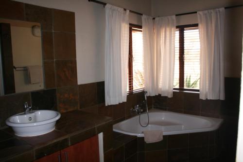 Et badeværelse på Makhato 84 Bush Lodge