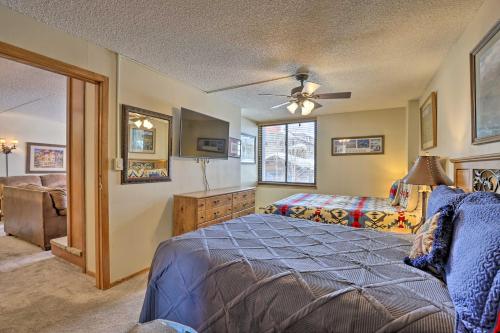 a bedroom with a bed and a ceiling fan at Copper Mountain Condo Walk to American Eagle Lift in Copper Mountain