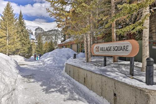 a sign for a ski centre in the snow at Copper Mountain Condo Walk to American Eagle Lift in Copper Mountain