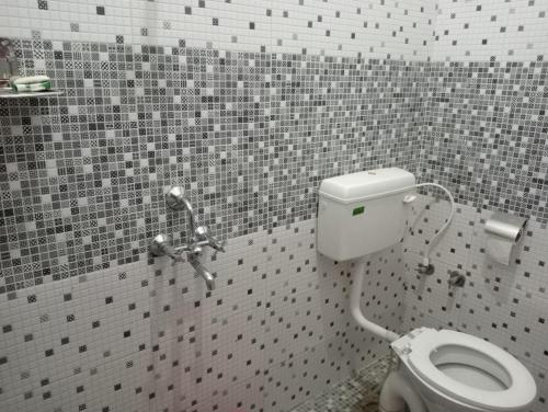 Ένα μπάνιο στο Peaceful Home Stay