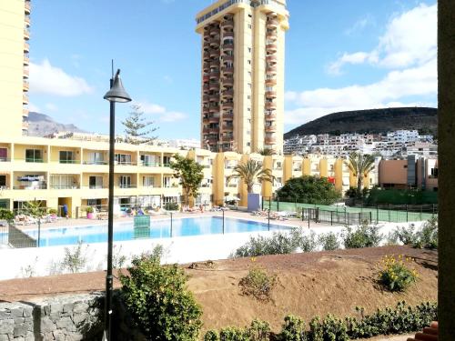 Bazén v ubytování Apartamento Playa de las vistas Torres del Sol C3 308 nebo v jeho okolí