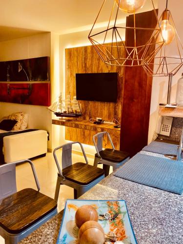 TV a/nebo společenská místnost v ubytování MORROS VITRI Luxury