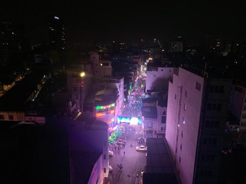 a view of a city street at night at Gemini Saigon LUXURY in Ho Chi Minh City