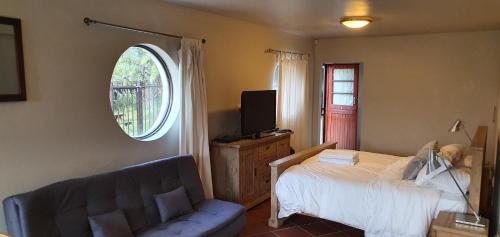 Postel nebo postele na pokoji v ubytování Agape holiday house