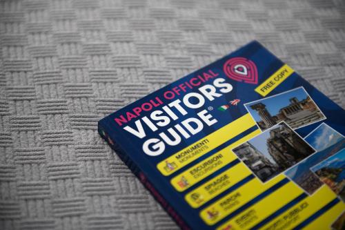 a book about a new inventory of vittoropers guide at Alma Suites in Naples