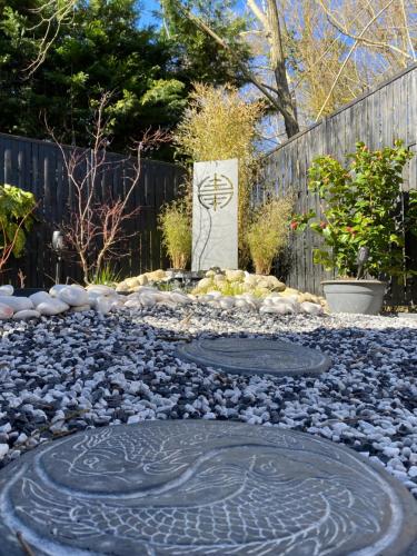 a rock garden with a labyrinth in the middle at Loveroom intimiste et haut de gamme à 30 min de Toulouse in Lagrâce-Dieu