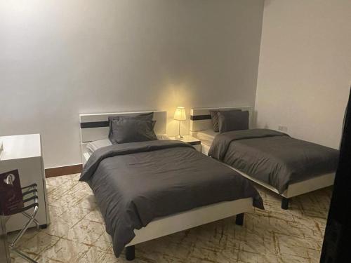 Ένα ή περισσότερα κρεβάτια σε δωμάτιο στο 2 Bedroom Villa in Ras Al Khaimah with Privat swimming Pool
