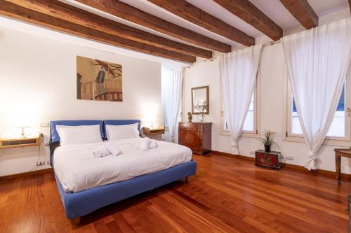Posteľ alebo postele v izbe v ubytovaní Ca' Meraviglia