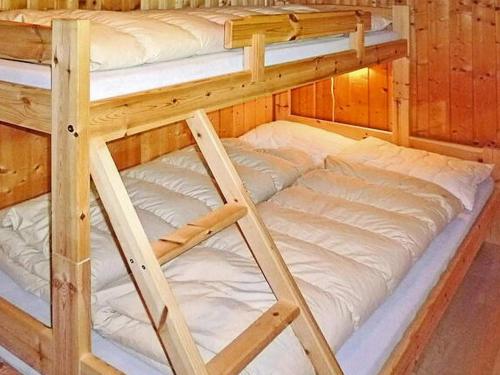 a couple of bunk beds in a cabin at 6 person holiday home in olden-By Traum in Olden