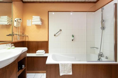 Ванная комната в Hotel De La Paix