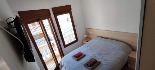 Posteľ alebo postele v izbe v ubytovaní Beach Breeze Townhouse by the beach