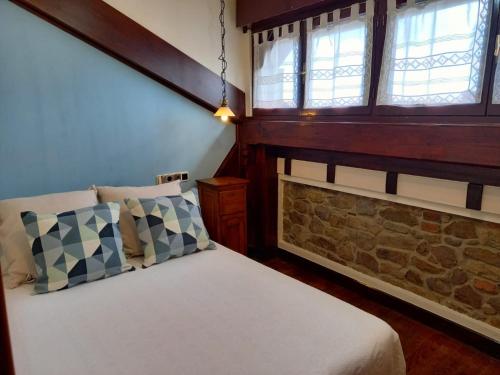 Postel nebo postele na pokoji v ubytování Hotel Eutimio