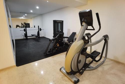 Phòng/tiện nghi tập thể dục tại Castelo Hotel