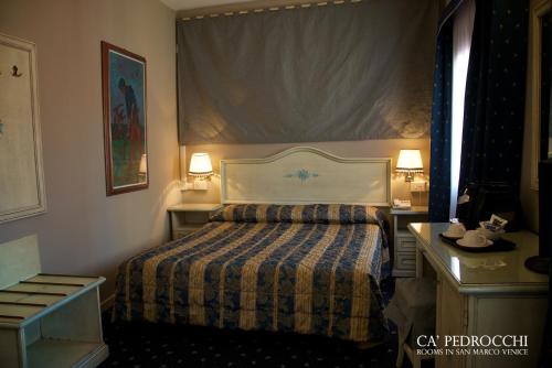 Voodi või voodid majutusasutuse Ca' Pedrocchi toas