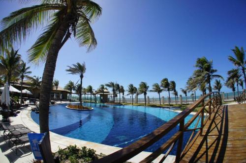 Kolam renang di atau di dekat Golf Ville Resort in Beach Park