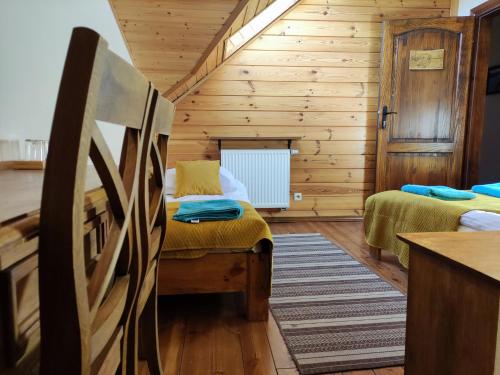 Postel nebo postele na pokoji v ubytování Dolina Biebrzy - Ośrodek Agroturystyczny