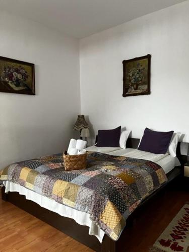 a bedroom with two beds in a room at House of Julia in Sighişoara