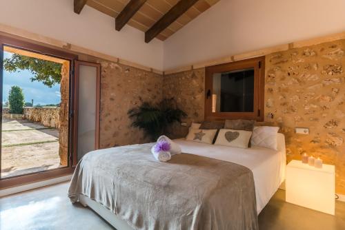 Gulta vai gultas numurā naktsmītnē Ideal Property Mallorca - Pleta