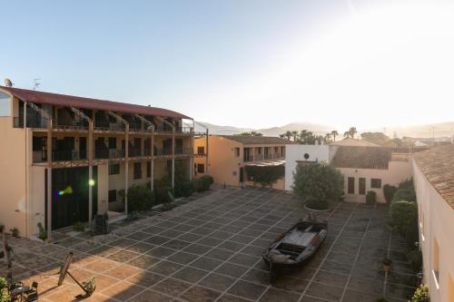 an aerial view of a courtyard of a building at La Tonnara di Bonagia Resort in Valderice