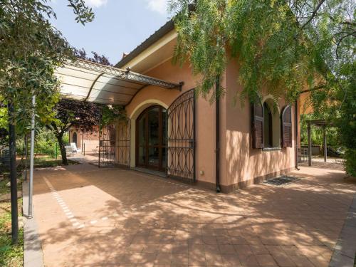 an entrance to a building with a gate at Holiday Home Villa Trabbia by Interhome in Cisano sul Neva