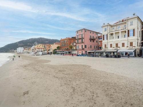 a view of a beach with buildings on it at Apartment Terrazza sul molo by Interhome in Alassio