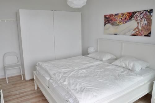 Postel nebo postele na pokoji v ubytování Duinerei appartement C102