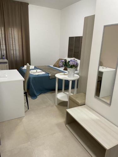 Cama o camas de una habitación en BaroccoSuite