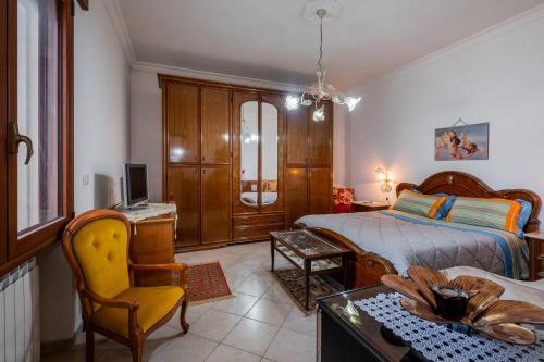 Ένα ή περισσότερα κρεβάτια σε δωμάτιο στο Villa Salento