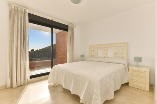 Postel nebo postele na pokoji v ubytování Exclusivo apartamento de 2 dormitorios vista mar lateral