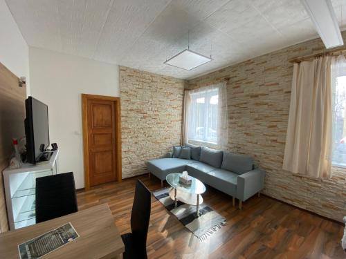 TV a/nebo společenská místnost v ubytování Apartment Hlinská