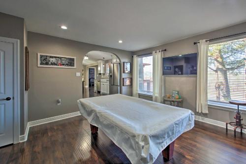 a hospital room with a bed and a hallway at Hot Tub and Views Waterfront Escape in Hot Springs in Hot Springs