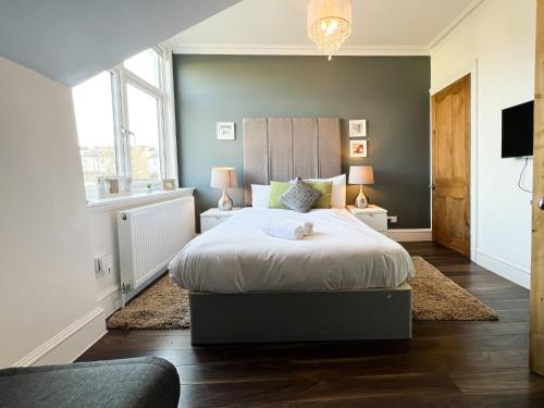 En eller flere senge i et værelse på Barfillan House in Glasgow