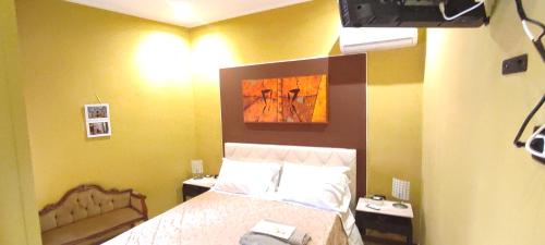 a bedroom with a bed in a room at B&B miccoli in Grottaglie