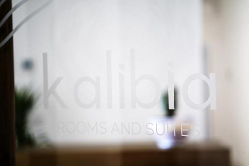 a sign that reads kiting rooms and suites at Kalibia rooms and suites in Mazara del Vallo