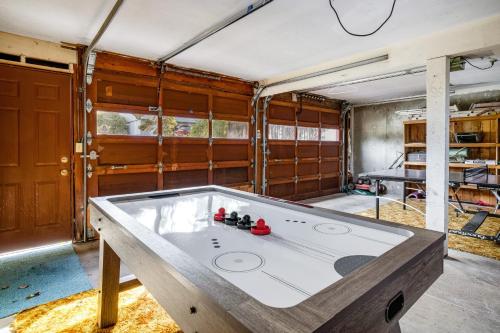 a room with a ping pong table in it at The Eagle's Nest in Lincoln City