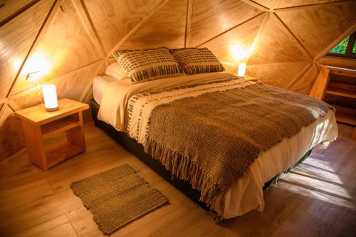 Cama o camas de una habitación en Refugios del Ranco