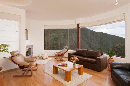 a living room with a couch and a table at El Crater in San Antonio
