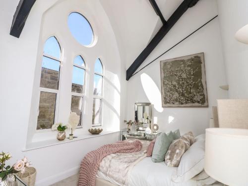 Ένα ή περισσότερα κρεβάτια σε δωμάτιο στο Pilgrims Loft