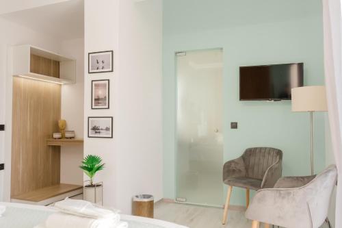 TV a/nebo společenská místnost v ubytování Island Apartments