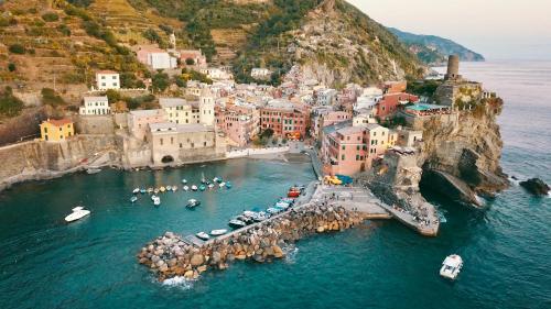an aerial view of a town on the water at La Ripa Camere Vernazza - Stradivari Luxury Apartment in Vernazza
