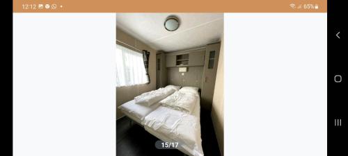 Voodi või voodid majutusasutuse Bosuil toas