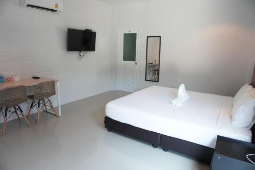 Katil atau katil-katil dalam bilik di กรณวรรณ รีสอร์ท