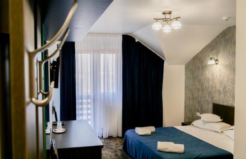 Postel nebo postele na pokoji v ubytování Motel Infinit