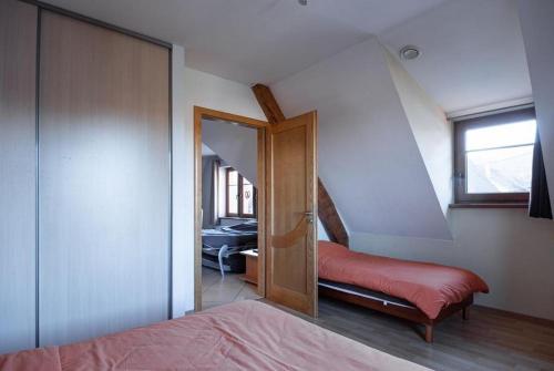 Ліжко або ліжка в номері Gîtes Goettelmann Didier